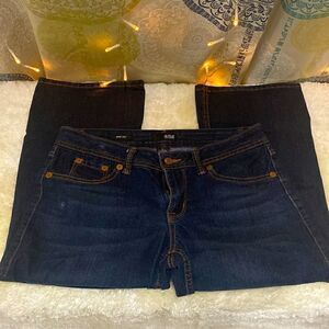 a.n.a, Boot cut jeans with accent designs on back pockets. Dark wash. Womens 4.